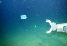 我國(guó)自主研制的6000米級(jí)深海無(wú)人遙控潛水器“海琴”號(hào)在南海成功海試